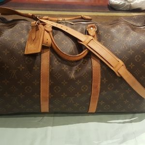 Authentic Louis Vuitton bandouliere 60